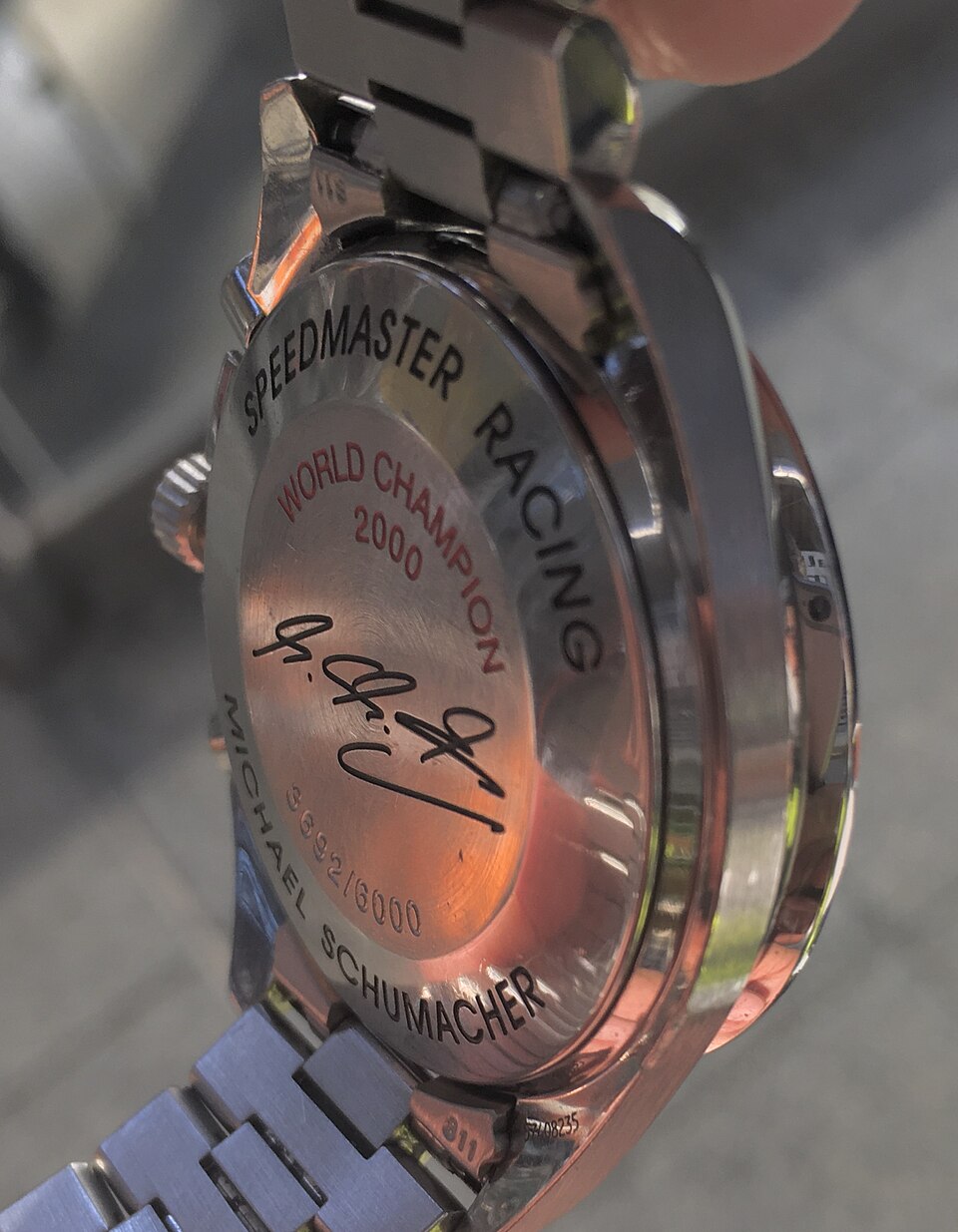 Omega Speedmaster Racing: Speedmaster Racing Michael Schumacher Edition World Championship 2000 (3518.50 per the file), dial side; same watch as the montage